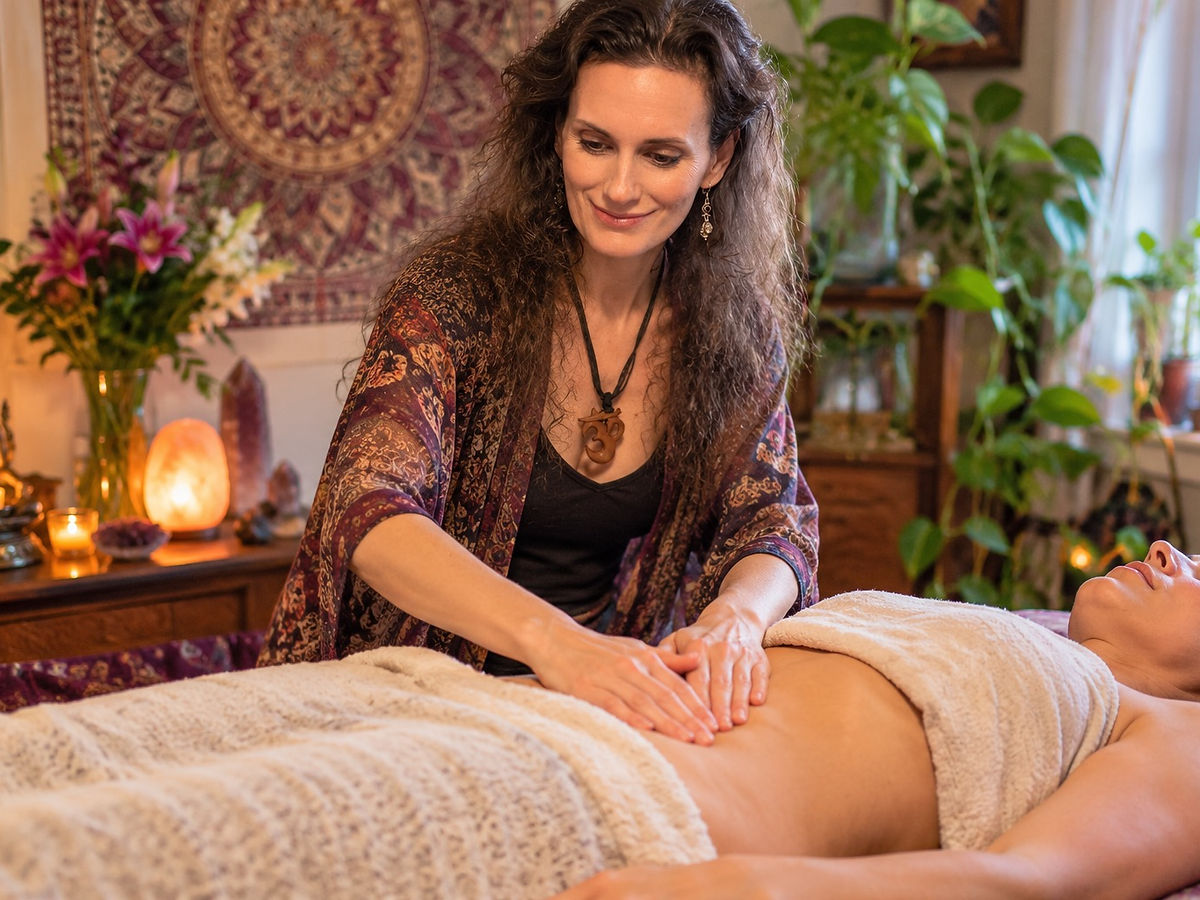 Gentle belly massage during a holistic bodywork session